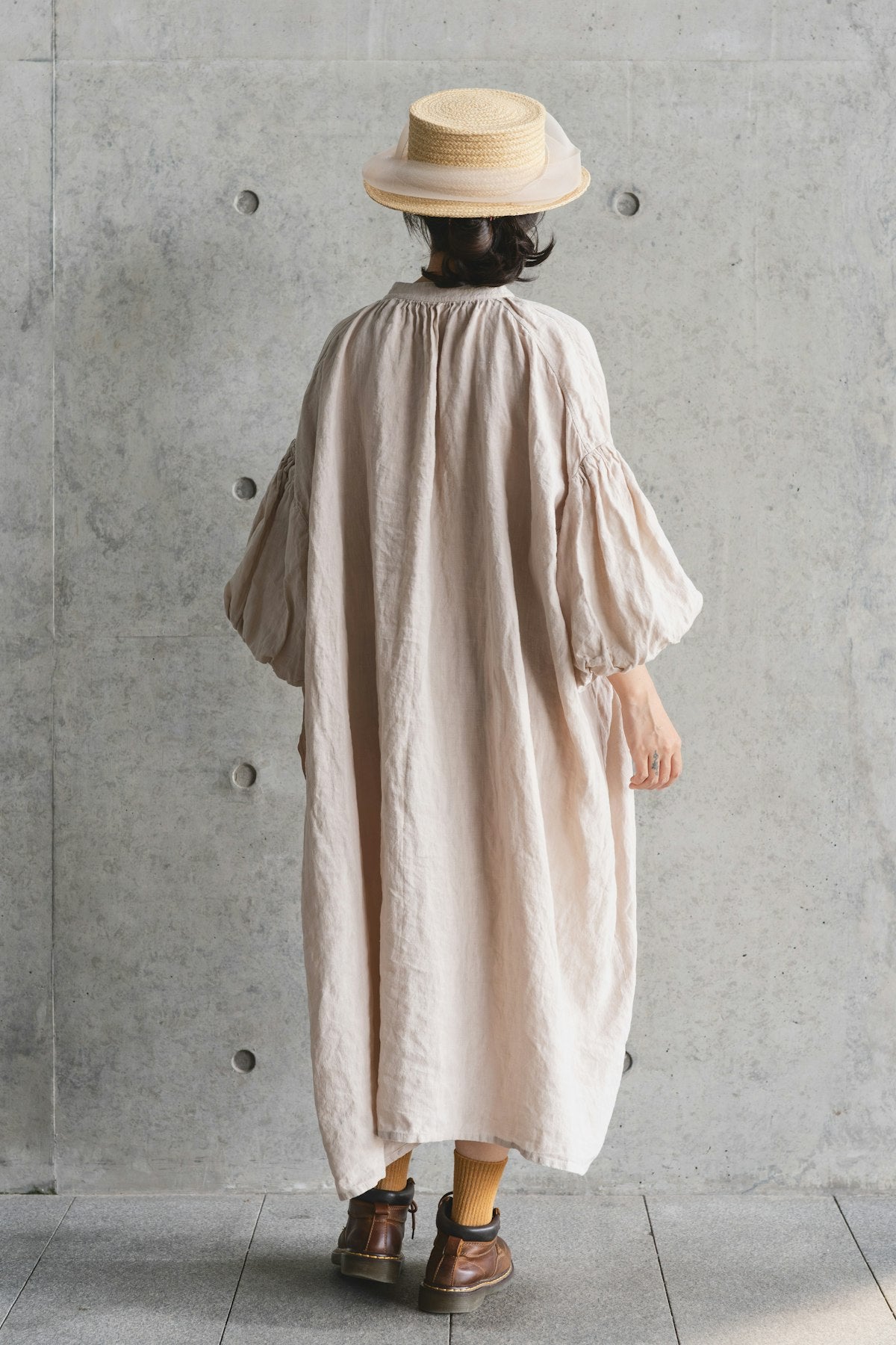 The Linen Shirt Dress styled with straw hat